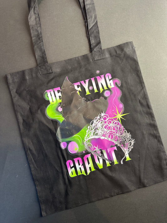 Defying gravity tote bag