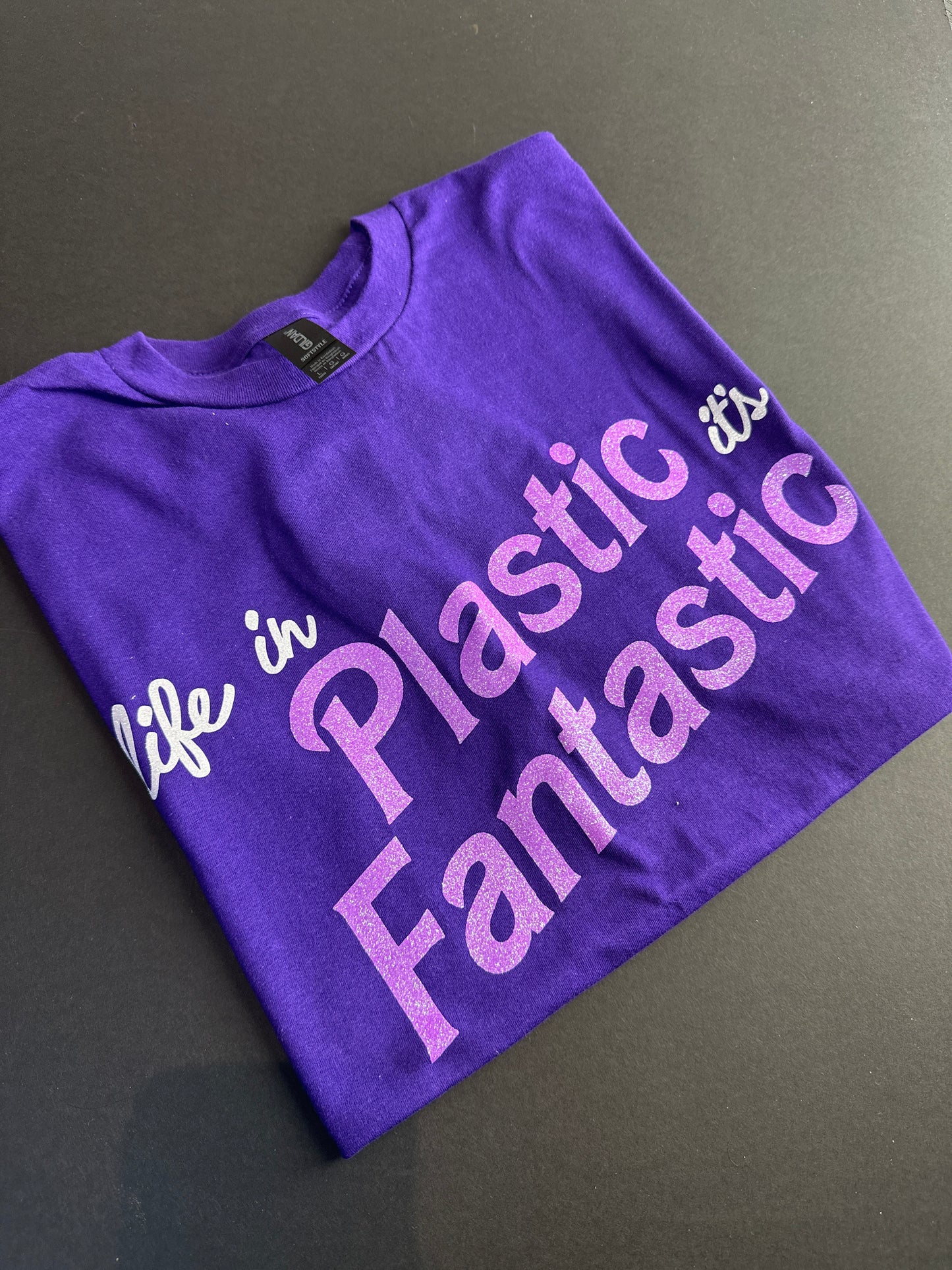 Large life in plastic barbie glitter tee