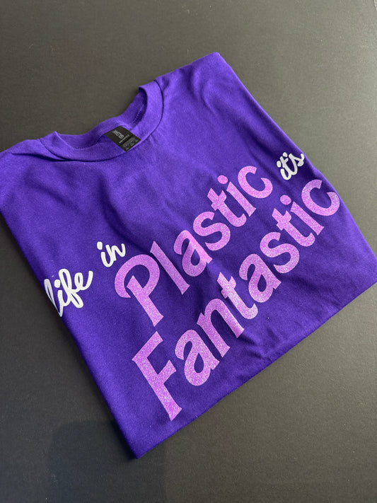 Large life in plastic barbie glitter tee