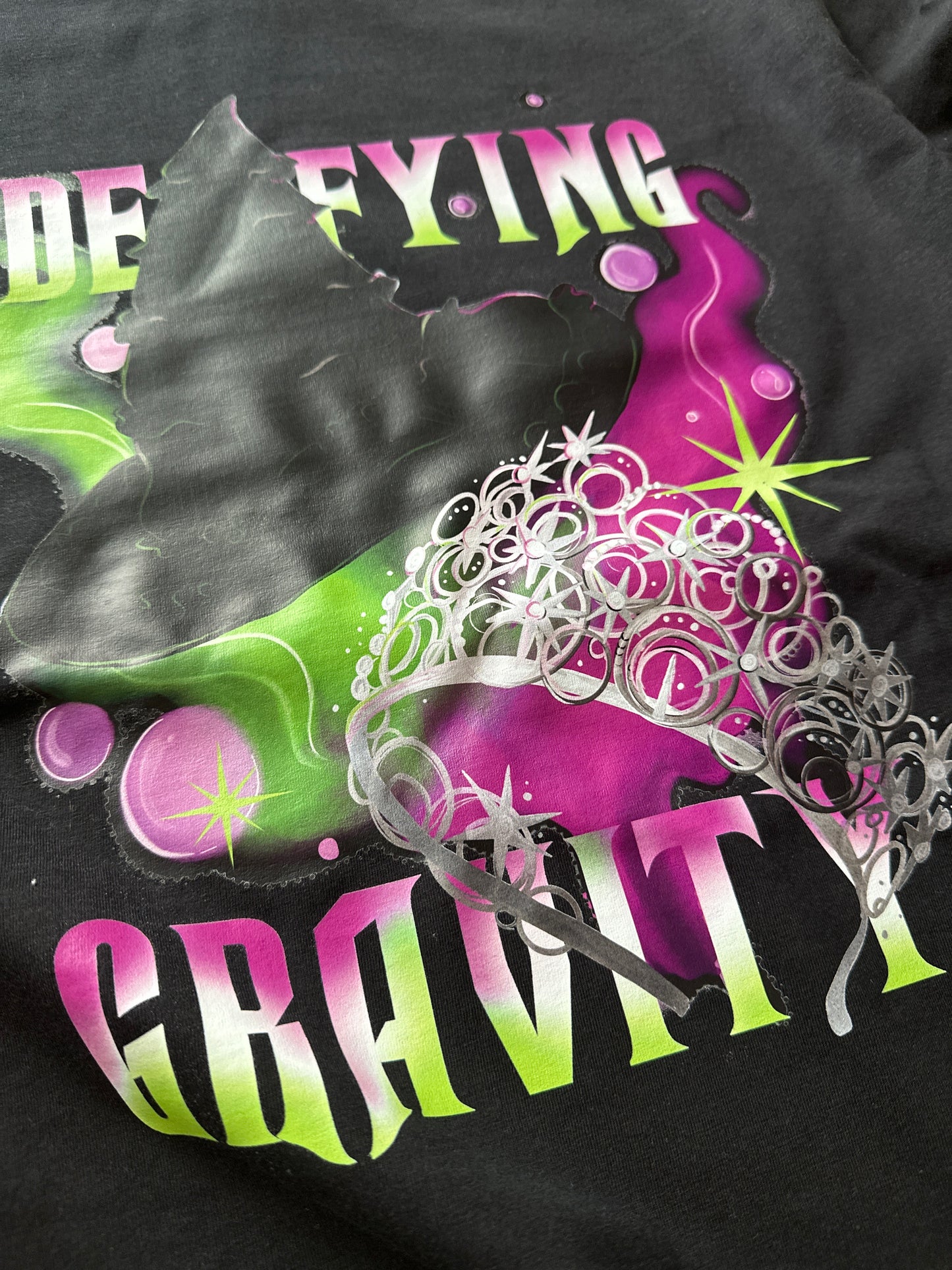 Large defying gravity tee